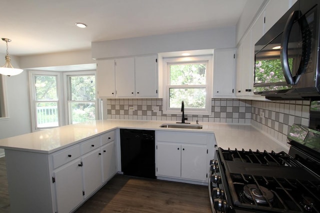 1960 Slippery Rock Rd, Naperville, IL 60565 - kitchen with black appliances, a sink, a peninsula, decorative backsplash, and recessed lighting