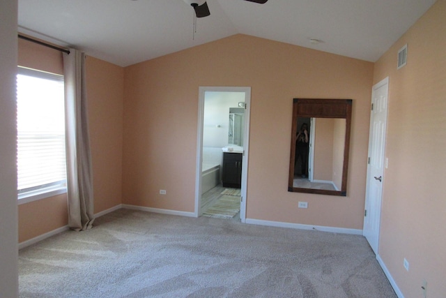 164 Blue Heron Ct, Round Lake, IL 60073 - unfurnished room with ceiling fan, vaulted ceiling, carpet floors, and baseboards