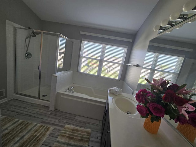 164 Blue Heron Ct, Round Lake, IL 60073 - full bath with vanity, a garden tub, and a shower stall