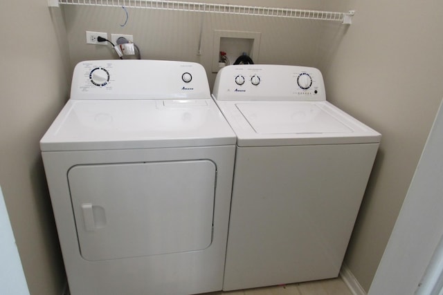 164 Blue Heron Ct, Round Lake, IL 60073 - laundry area featuring washing machine and clothes dryer