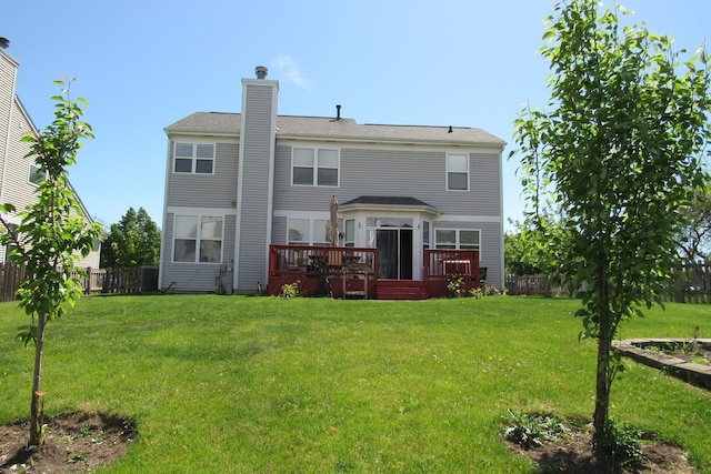 164 Blue Heron Ct, Round Lake, IL 60073 - back of house with a chimney and a deck