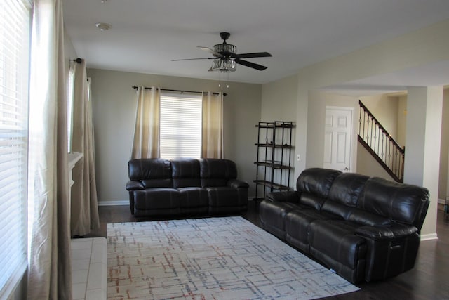 164 Blue Heron Ct, Round Lake, IL 60073 - living room with ceiling fan, baseboards, wood finished floors, and stairs