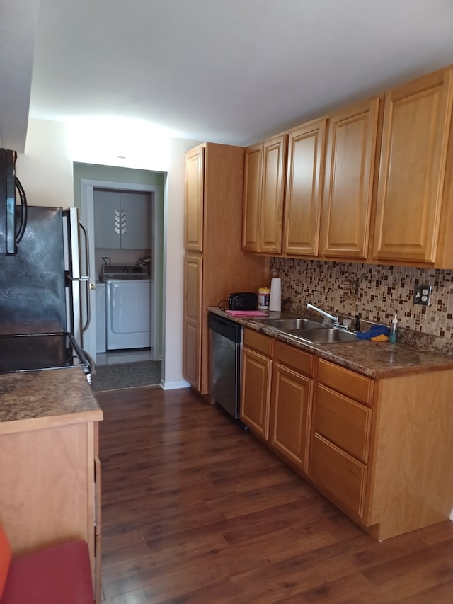 70 Old Oak Dr Unit 226, Buffalo Grove, IL 60089 - kitchen with dishwasher, a sink, freestanding refrigerator, washer and dryer, and dark wood-type flooring