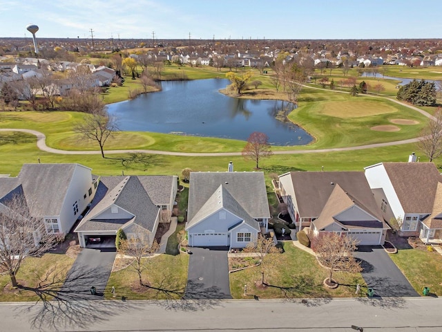 aerial view of residential area with a large body of water and a golf club