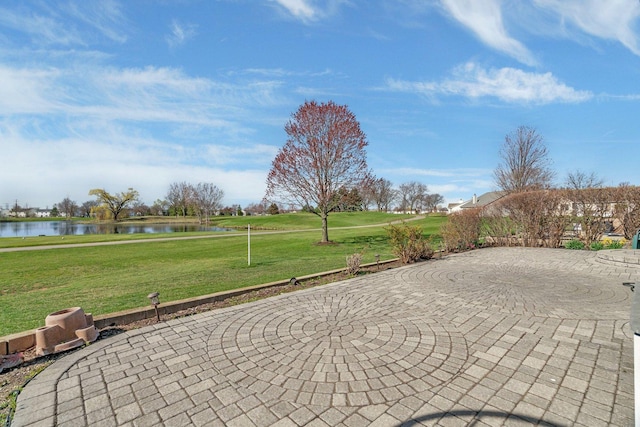 view of patio / terrace with a water view