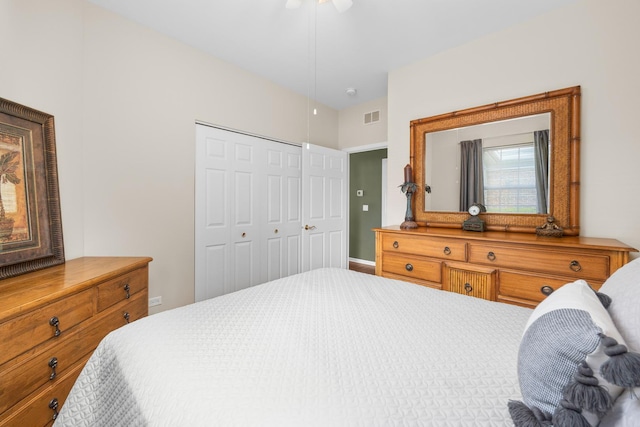bedroom with a closet and a ceiling fan
