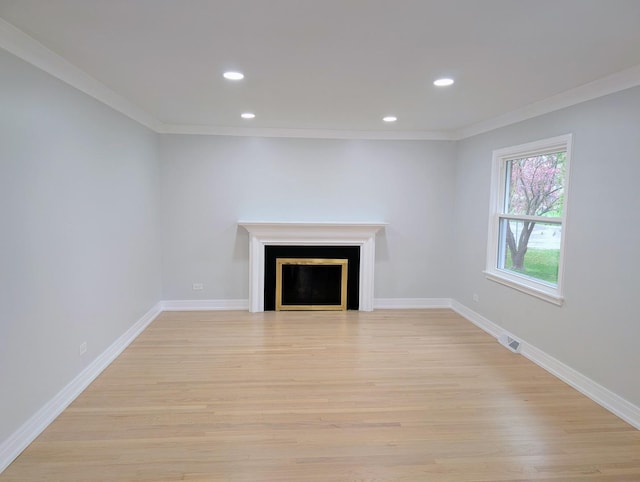 27W075 Fleming Dr, Winfield, IL 60190 - unfurnished living room featuring light wood finished floors, recessed lighting, a fireplace, ornamental molding, and baseboards