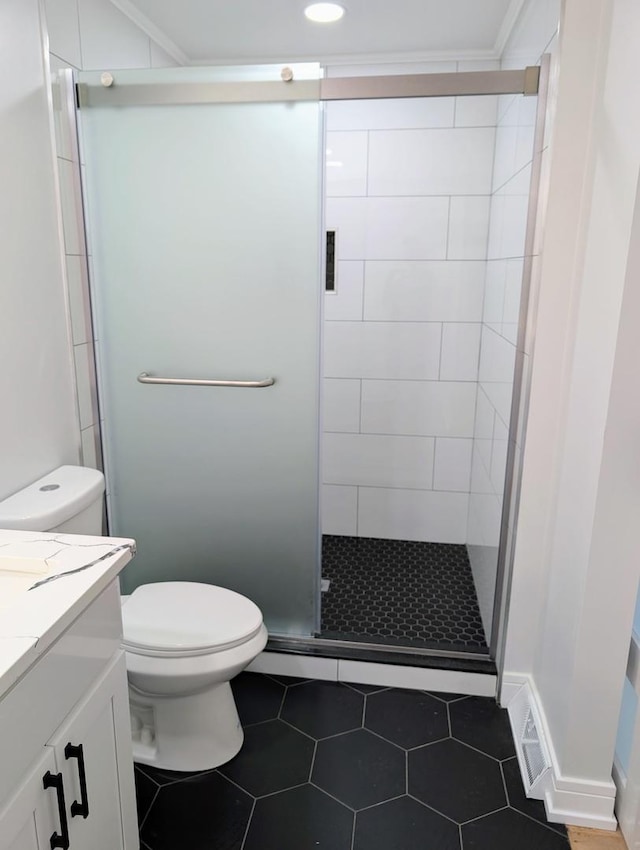 27W075 Fleming Dr, Winfield, IL 60190 - bathroom with toilet, a shower stall, vanity, and tile patterned flooring