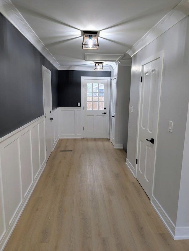 27W075 Fleming Dr, Winfield, IL 60190 - corridor with crown molding, light wood finished floors, a wainscoted wall, and a decorative wall