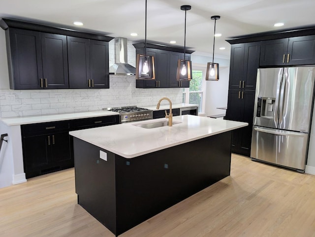27W075 Fleming Dr, Winfield, IL 60190 - kitchen with appliances with stainless steel finishes, wall chimney range hood, a sink, dark cabinets, and decorative backsplash