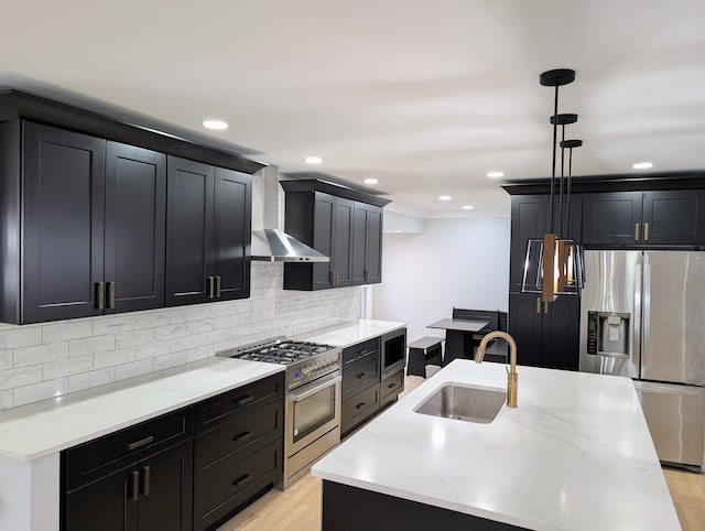 27W075 Fleming Dr, Winfield, IL 60190 - kitchen with a sink, stainless steel appliances, wall chimney exhaust hood, dark cabinets, and recessed lighting
