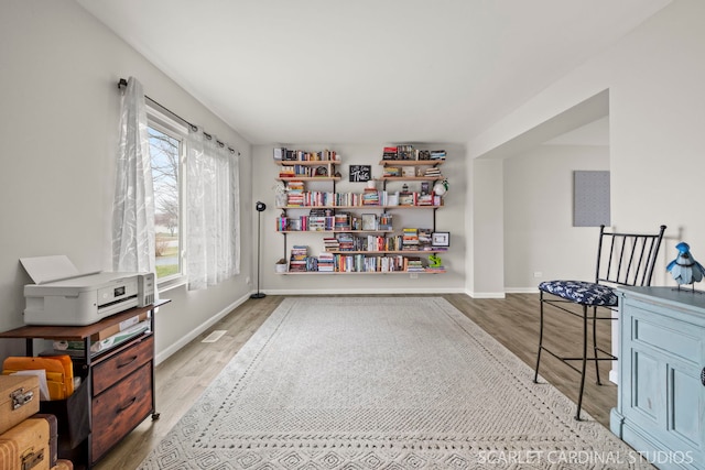 327 Persimmon Ln, Oswego, IL 60543 - sitting room with light wood-style floors and baseboards