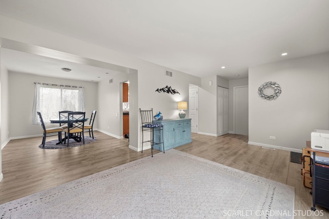327 Persimmon Ln, Oswego, IL 60543 - living area with light wood-style flooring, baseboards, and recessed lighting