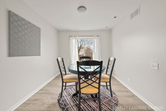 327 Persimmon Ln, Oswego, IL 60543 - dining room with light wood-style flooring and baseboards