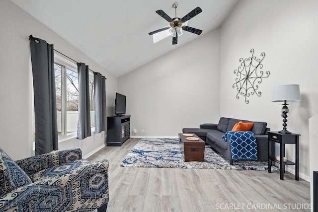 327 Persimmon Ln, Oswego, IL 60543 - living room with ceiling fan, light wood-type flooring, high vaulted ceiling, and baseboards