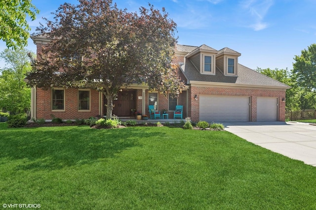 551 Salceda Ln, Mundelein, IL 60060 - view of front of property featuring concrete driveway, an attached garage, a porch, and brick siding