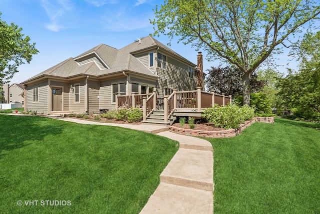 551 Salceda Ln, Mundelein, IL 60060 - back of property with a deck, a lawn, roof with shingles, and a chimney