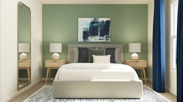 bedroom with carpet flooring and baseboards