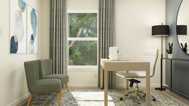 office space with baseboards