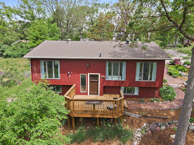 543 Blackhawk Dr, Lake In The Hills, IL 60156 - rear view of property featuring a shingled roof and a deck