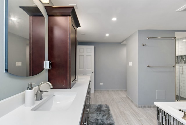 543 Blackhawk Dr, Lake In The Hills, IL 60156 - full bathroom with vanity, recessed lighting, wood finished floors, and baseboards