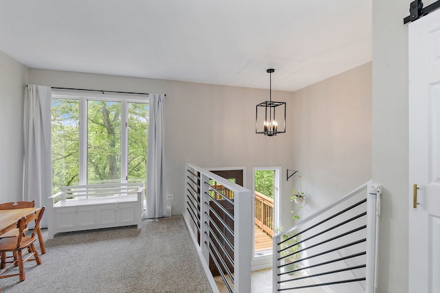543 Blackhawk Dr, Lake In The Hills, IL 60156 - stairs featuring a chandelier and carpet
