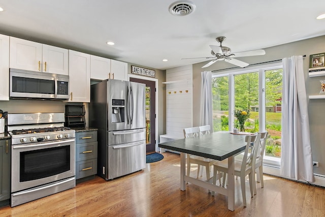 543 Blackhawk Dr, Lake In The Hills, IL 60156 - kitchen featuring appliances with stainless steel finishes, white cabinetry, recessed lighting, a ceiling fan, and light wood-style flooring