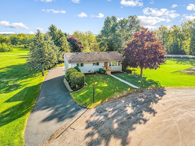 1659 Larchmont Rd, Davis, IL 61019 - view of front of home with asphalt driveway and a front lawn