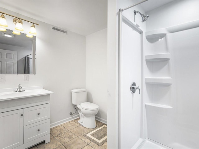 1659 Larchmont Rd, Davis, IL 61019 - bathroom featuring a shower stall, vanity, baseboards, and toilet
