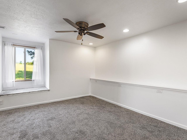 1659 Larchmont Rd, Davis, IL 61019 - unfurnished room with carpet floors, ceiling fan, baseboards, recessed lighting, and a textured ceiling