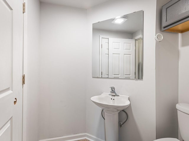 1659 Larchmont Rd, Davis, IL 61019 - half bathroom featuring toilet