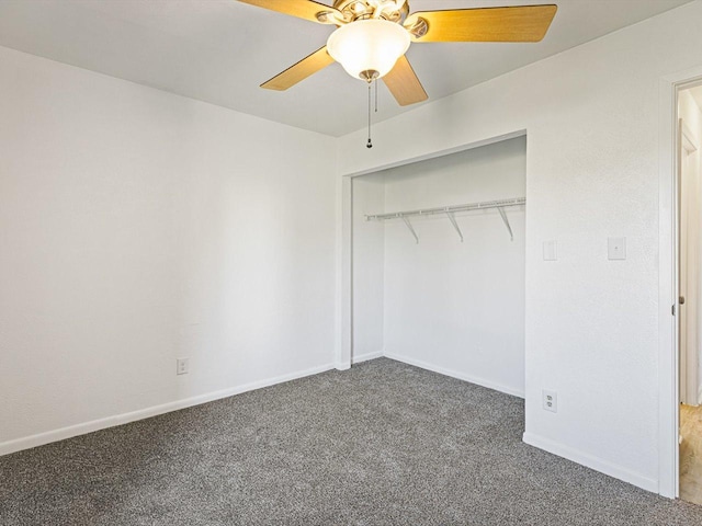 1659 Larchmont Rd, Davis, IL 61019 - unfurnished bedroom with carpet flooring, baseboards, a closet, and a ceiling fan