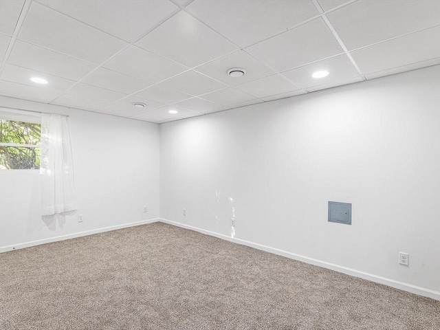 1659 Larchmont Rd, Davis, IL 61019 - unfurnished room with carpet floors, recessed lighting, a paneled ceiling, and baseboards