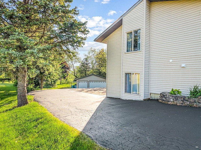 1659 Larchmont Rd, Davis, IL 61019 - view of side of property with an outbuilding and a detached garage