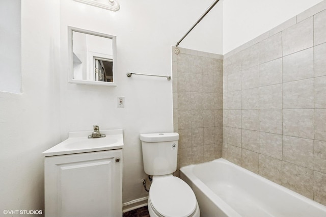 6945 S Eberhart Ave, Chicago, IL 60637 - bathroom featuring toilet, vanity, and tub / shower combination