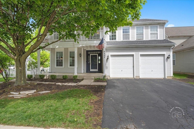 343 Diane Ct, Geneva, IL 60134 - view of front of property with a porch, a garage, and asphalt driveway