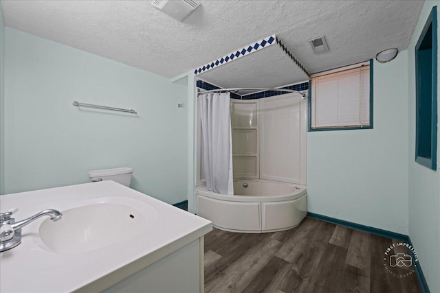 343 Diane Ct, Geneva, IL 60134 - full bathroom featuring wood finished floors, shower / tub combo, a textured ceiling, and vanity