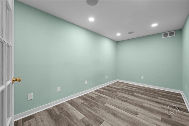 343 Diane Ct, Geneva, IL 60134 - empty room featuring wood finished floors, recessed lighting, and baseboards