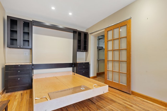 3230 W Fulton Blvd, Chicago, IL 60624 - unfurnished office featuring light wood-style flooring, baseboards, and recessed lighting