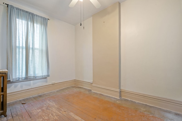 3230 W Fulton Blvd, Chicago, IL 60624 - spare room featuring hardwood / wood-style floors and a ceiling fan