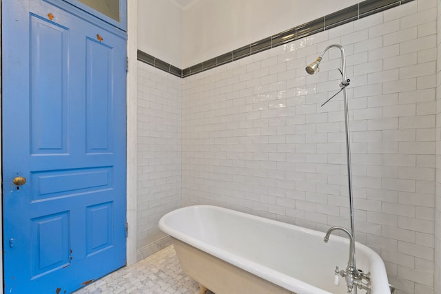 3230 W Fulton Blvd, Chicago, IL 60624 - bathroom featuring a soaking tub and tile walls