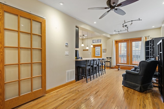 3230 W Fulton Blvd, Chicago, IL 60624 - living area with a ceiling fan, hardwood / wood-style floors, baseboards, rail lighting, and recessed lighting