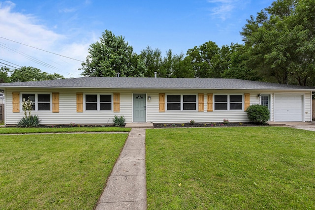 1802 Meadow Dr, Champaign, IL 61821 - ranch-style house featuring a front lawn and an attached garage