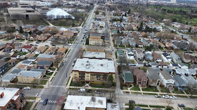 aerial view of property's location featuring nearby suburban area