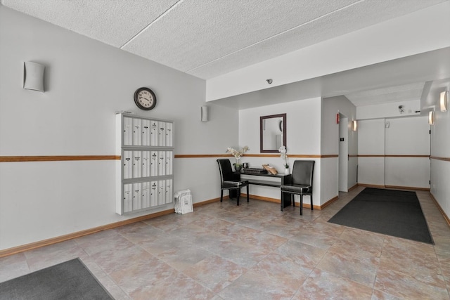 building lobby with a textured ceiling