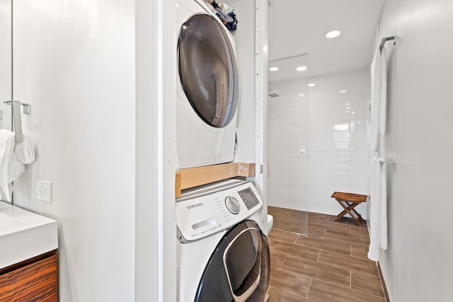 1725 W N Ave Unit 404, Chicago, IL 60622 - laundry area with stacked washer / drying machine, recessed lighting, and wood tiled floors