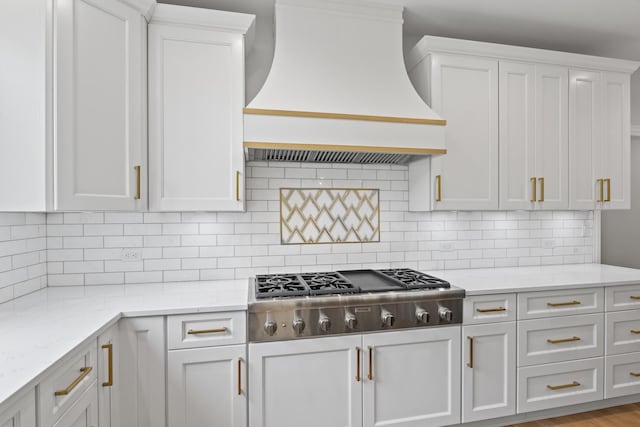 1410 W Newcastle Ct, Inverness, IL 60010 - kitchen featuring custom range hood, stainless steel gas cooktop, white cabinetry, and backsplash