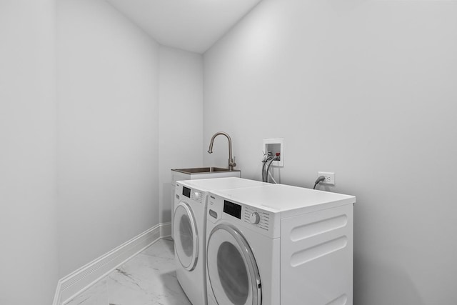 1410 W Newcastle Ct, Inverness, IL 60010 - laundry area featuring light marble finish floors, washer and dryer, and baseboards