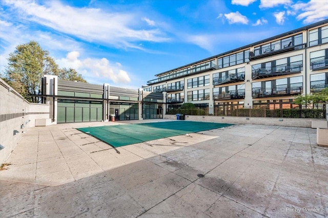 1001 W 15th St Unit 243, Chicago, IL 60608 - view of pool featuring a patio and fence