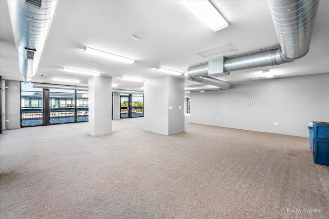 1001 W 15th St Unit 243, Chicago, IL 60608 - below grade area with carpet flooring and healthy amount of natural light